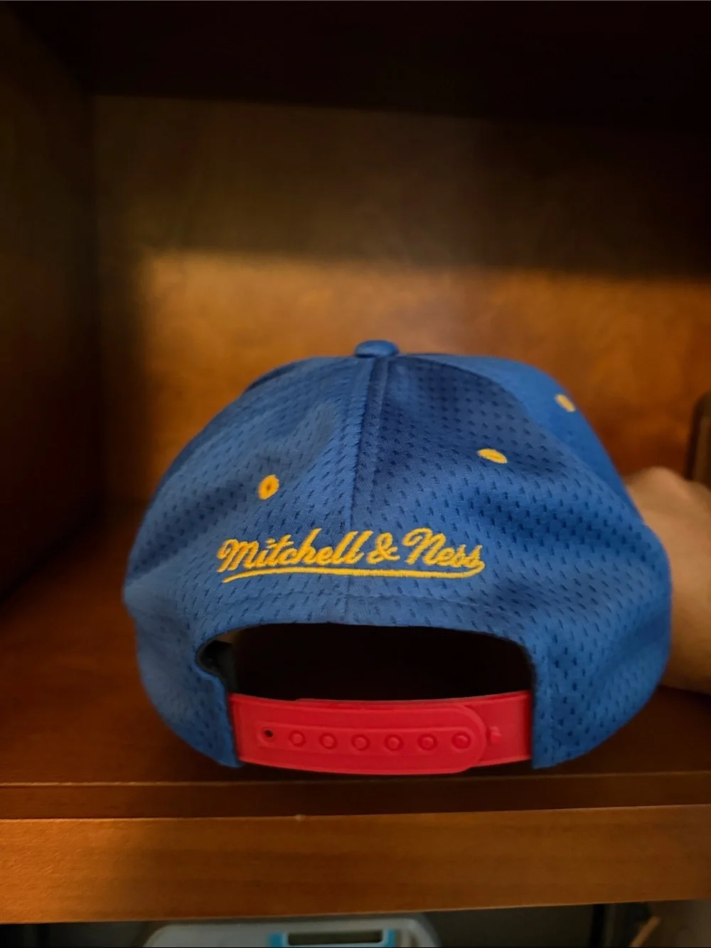 Mitchell & Ness Blue Snapback Hat with Yellow Embroidery and Red Strap